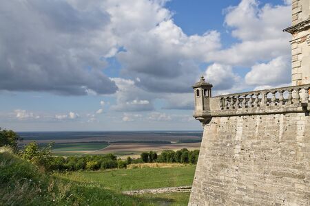 landscape with cloudy sky and part of Pidhirtsi Castle in Ukraine