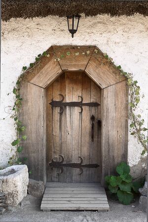 the door to the ancient Ukrainian hut closeup