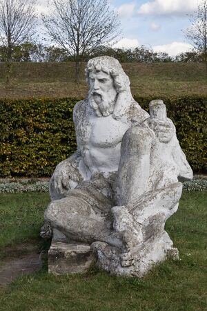 Neptune statue in the garden of the castle in Zolochiv Ukraine. Vertical positionの写真素材