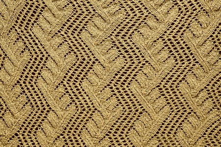 texture yellow knitted openwork pattern closeupの写真素材