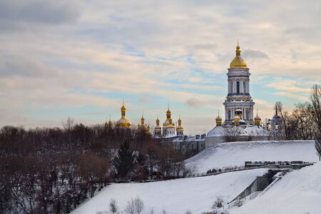 winter landscape with the Kiev-Pechersk Lavra and cloudy sky. Ukrainian sightsの写真素材