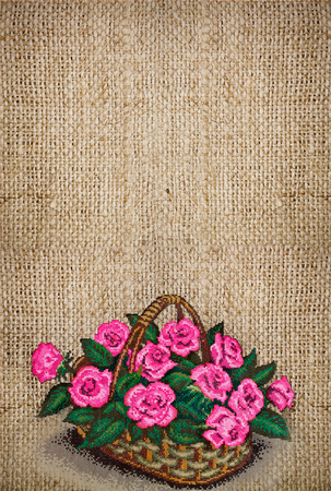 vertical canvas background embroidered with a basket of pink roses and copy spaceの写真素材