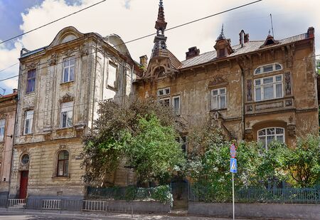 An old house with a turret on the street of Lvov, Ukraineの写真素材