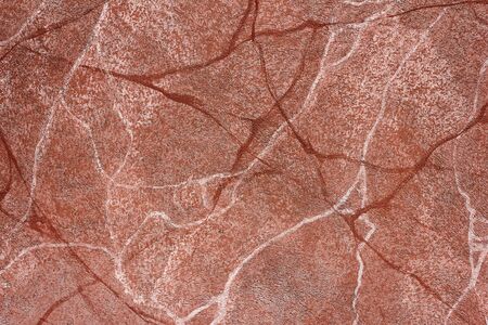 abstract surface facing stone with streaks and stains close upの写真素材