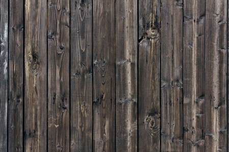 Close up of an old wooden fence from boardsの写真素材