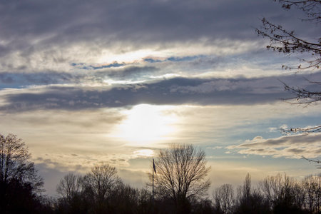 evening landscape with a sky covered with cloudsの写真素材