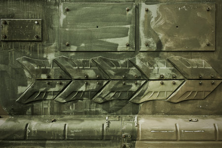 abstract khaki background metal tank armour close-upの写真素材