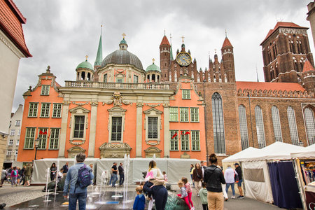 Gdansk, Poland - august 6: Gdansk Square with old buildings and fountain on august 6, 2021 in Gdansk, Polandのeditorial素材