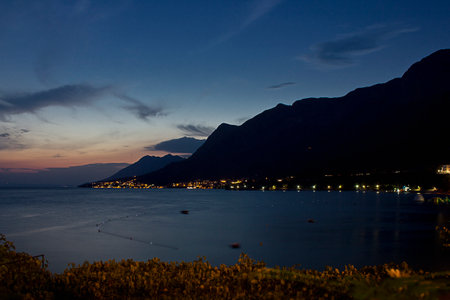 A seascape with a bright sunset over the seaの写真素材