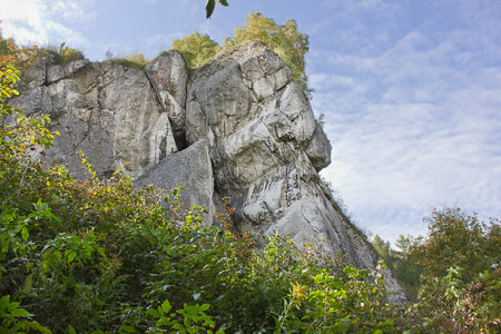Autumn landscape. A rock in an autumn forestの写真素材