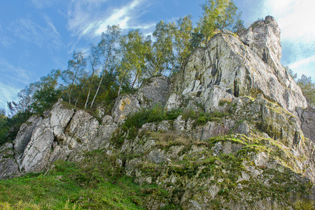Autumn landscape. A rock in an autumn forestの写真素材