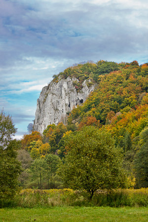 Autumn landscape. A rock in an autumn forestの写真素材