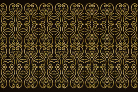 gold pearl bead pattern close-up on black backgroundの写真素材