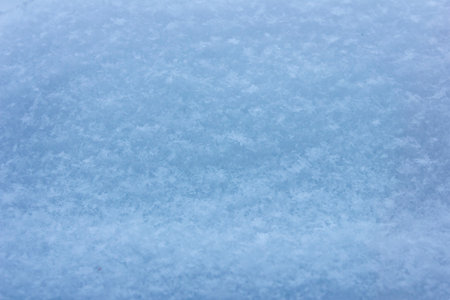 blue winter background snow texture close-upの写真素材