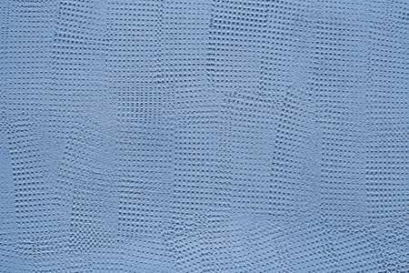 Abstract background texture blue relief wall close-upの写真素材