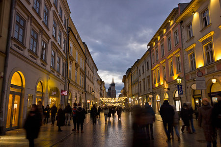 Evening street in the old centre of Krakow. Ancient architecture of Europe.の写真素材