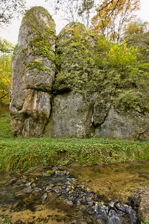 Autumn landscape with forest, river and rockの写真素材