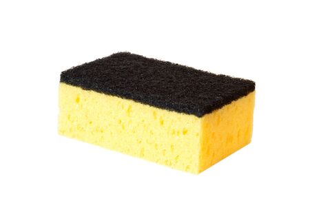 One yellow with black kitchen sponge for washing dishes isolated on white backgroundの写真素材