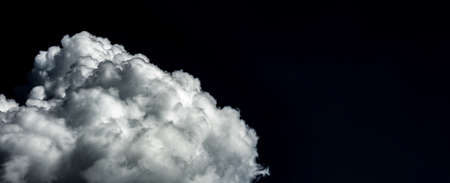 Artistic photo of sky with clouds in black and white colors, abstract nature backgroundの写真素材
