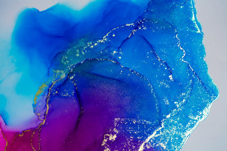 Abstract bright shiny color fluid background, hand drawn alcohol painting with golden streaks, liquid ink technique texture for high resolution backdrop designの写真素材