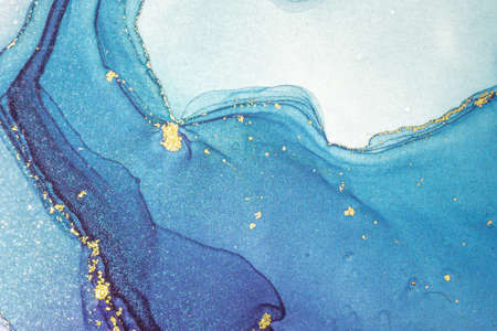 Abstract bright shiny color fluid background, hand drawn alcohol painting with golden streaks. Liquid ink technique texture for high resolution backdrop designの写真素材