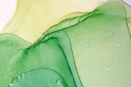 Abstract bright shiny color fluid background, hand drawn alcohol painting with golden streaks. Liquid ink technique texture for high resolution backdrop designの写真素材