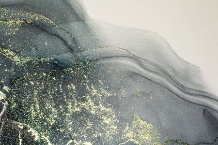 Abstract bright shiny color fluid background, hand drawn alcohol painting with golden streaks. Liquid ink technique texture for high resolution backdrop designの写真素材