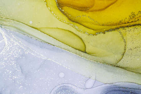 Abstract bright shiny color fluid background, hand drawn alcohol painting with golden streaks....
