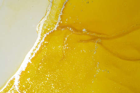 Abstract bright shiny color fluid background, hand drawn alcohol painting with golden streaks. Liquid ink technique texture for high resolution backdrop designの写真素材