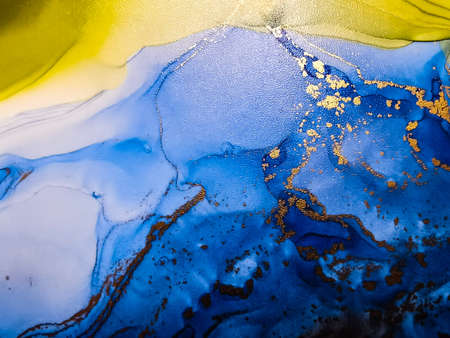 Abstract bright shiny color fluid background, hand drawn alcohol painting with golden streaks. Liquid ink technique texture for backdrop designの写真素材