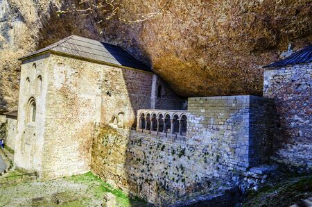 Religion temple under big rock in Spain.の写真素材