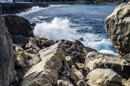 Beautiful and very detailed rocks, with nice, colorful and clean water background. This image is perfect for texture using and for precise and detailed working. The image is takken in Getaria city, Spain, at the Atlantic ocean.の写真素材