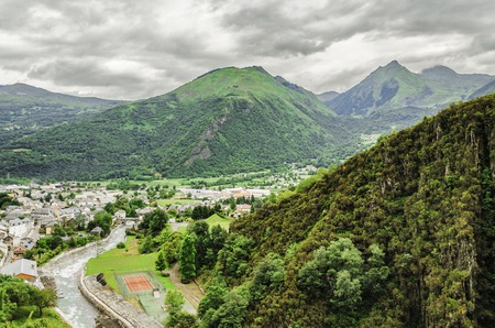 Clean cityscape below the Pyrenees mountains in Spainの写真素材