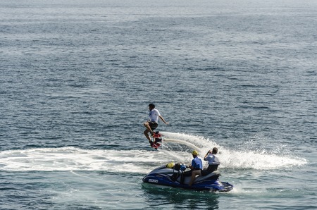 Man with flyboard in the ocean, close to Getaira cityのeditorial素材