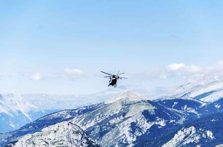 Chopper  patrolling over the mountain in Spainの写真素材