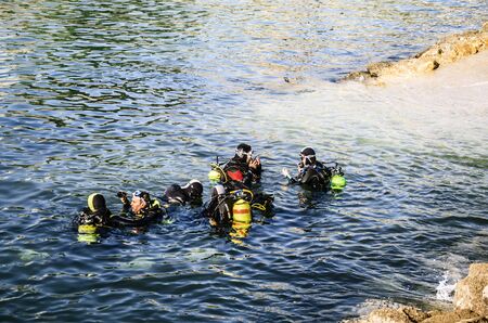 People diving under water close to Getaria cityのeditorial素材