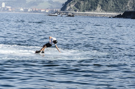 Man with flyboard in the ocean, close to Getaira cityのeditorial素材