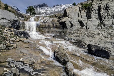 Waterfall in the ravine of IgÃ¼er - Aisa mountain range, Huesca Pyrenees