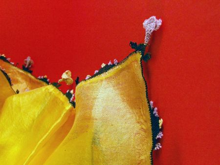 yellow scarf on redの写真素材
