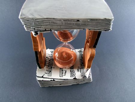 hourglass with notes