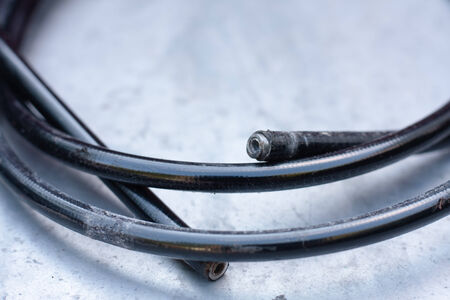 Close-up of a bicycle brake cable housingの写真素材