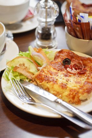 A croque monsieur sandwich with a side saladの写真素材