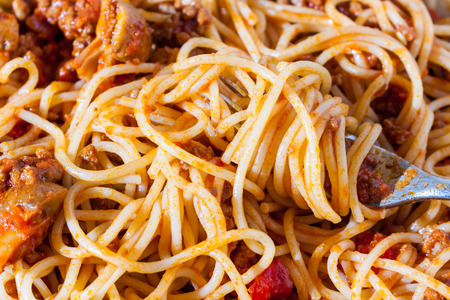 Classic Spaghetti Bolognese in a white pasta bowlの写真素材