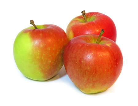 Group of ripe, red and green coloured apples, isolated on a white background                              の写真素材
