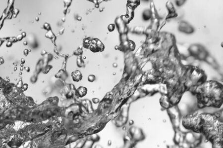 Fast moving water in fountainの写真素材