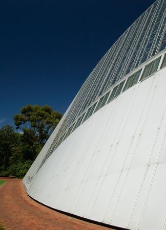 View of glass and metal greenhouseの写真素材