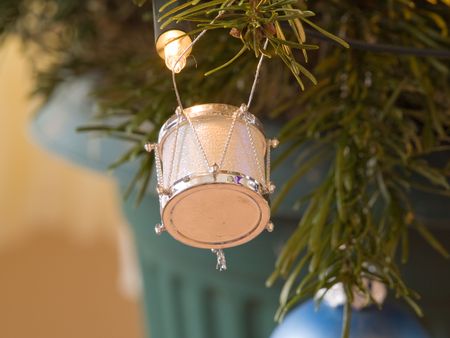 Bright and colourful Christmas Decorations on a treeの写真素材