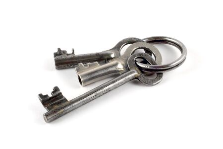 Old metal keys to barn with ringの写真素材