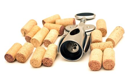 Corkscrew and bottle stoppers isolated on white backgroundの写真素材