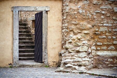 Entrance on the old stone stair in the ancient castleの写真素材